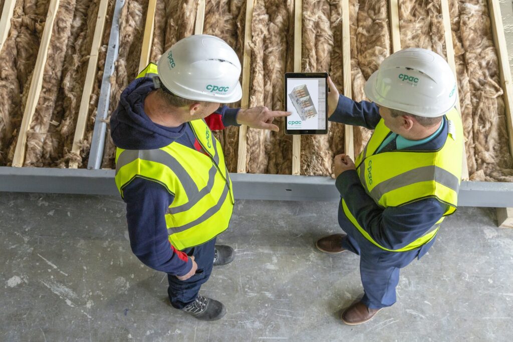 Construction workers reviewing plans